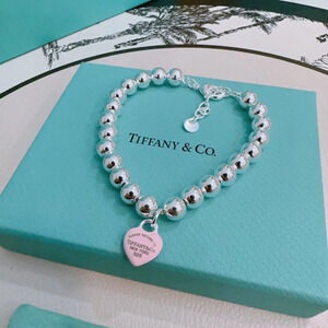 Tiffany & Co. Pink Heart Silver Bead Bracelet